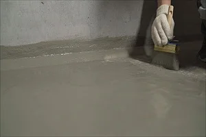 Polymer modified cementitious waterproofing coating